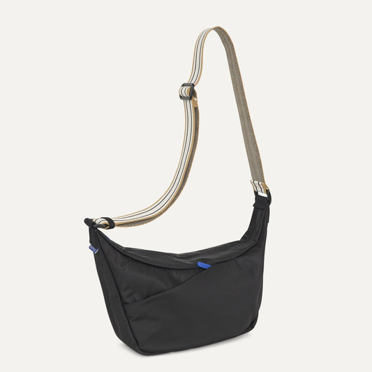 Rothy's Lightweight Travel Sling Bag in Ink