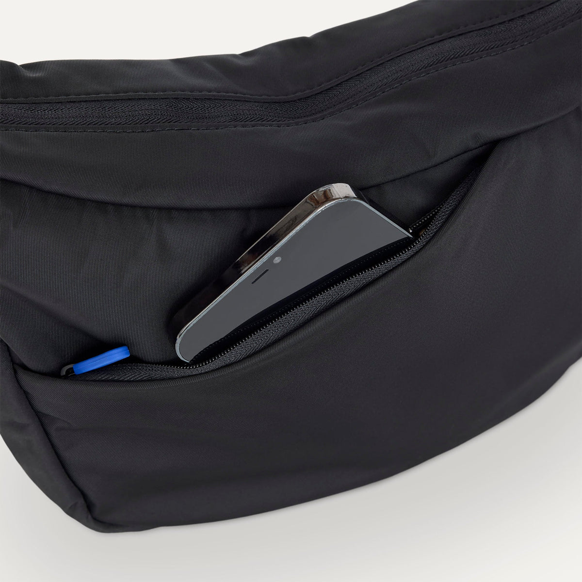 Rothy's Lightweight Travel Sling Bag in Ink