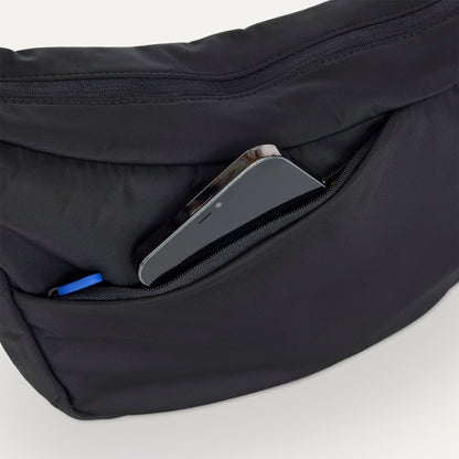 Rothy's Lightweight Travel Sling Bag in Ink