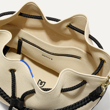 Rothy's The Cinch Bucket Bag in Black and White Raffia-Knit