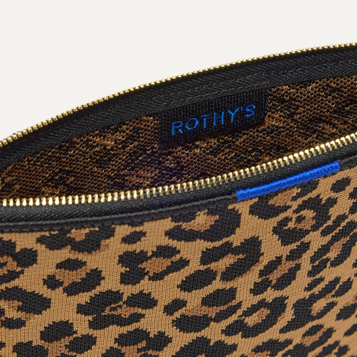 Rothy's The Convertible Clutch in Toasty Cat